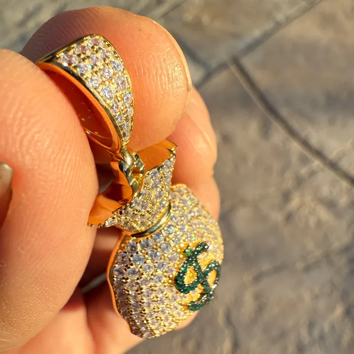 14k Gold Plated over 925 Sterling Silver Iced Money Bag Emoji Pendant Bling Cartel Necklaces 14k Gold Plated over 925 Sterling Silver Iced Money Bag Emoji Pendant Bling Cartel Necklaces
